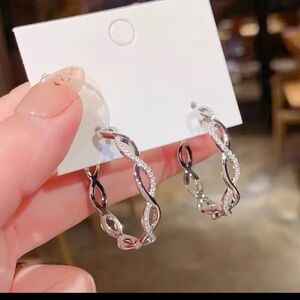 Twisted Dazzle Hoop Silver Earrings Zirconia